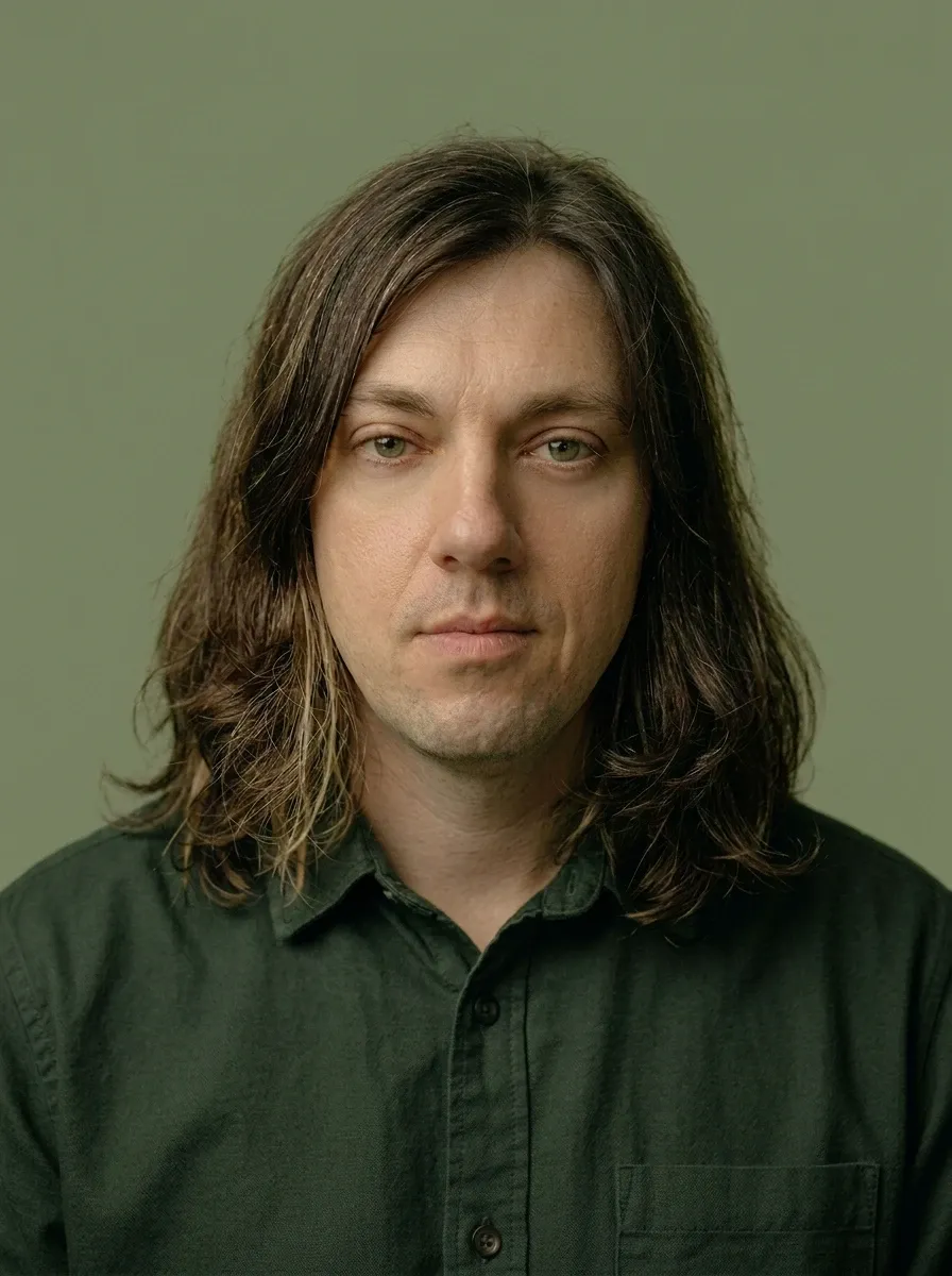 Akos Szep, Client Partner at WeGrow. Portrait photo.