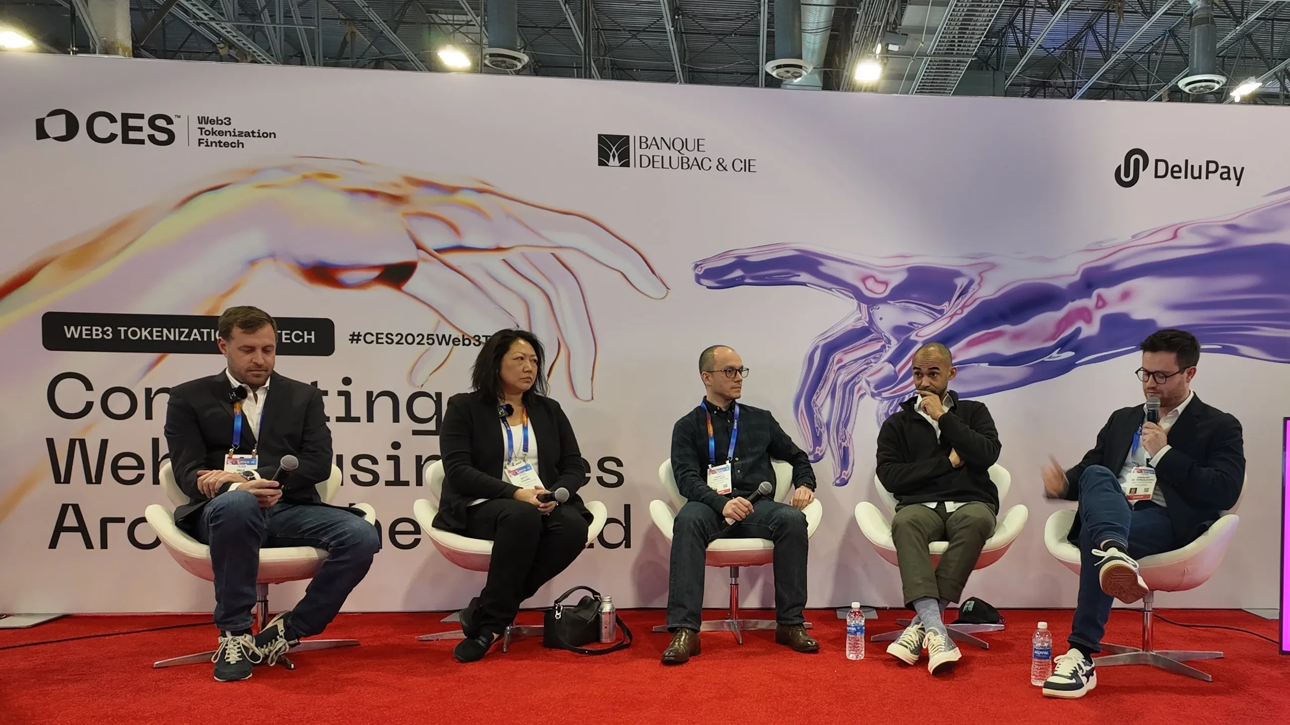 Banque Delubac & Cie brand on CES 2025 Web3 Tokenization panel stage alongside DeluPay. Fintech identity by WeGrow.